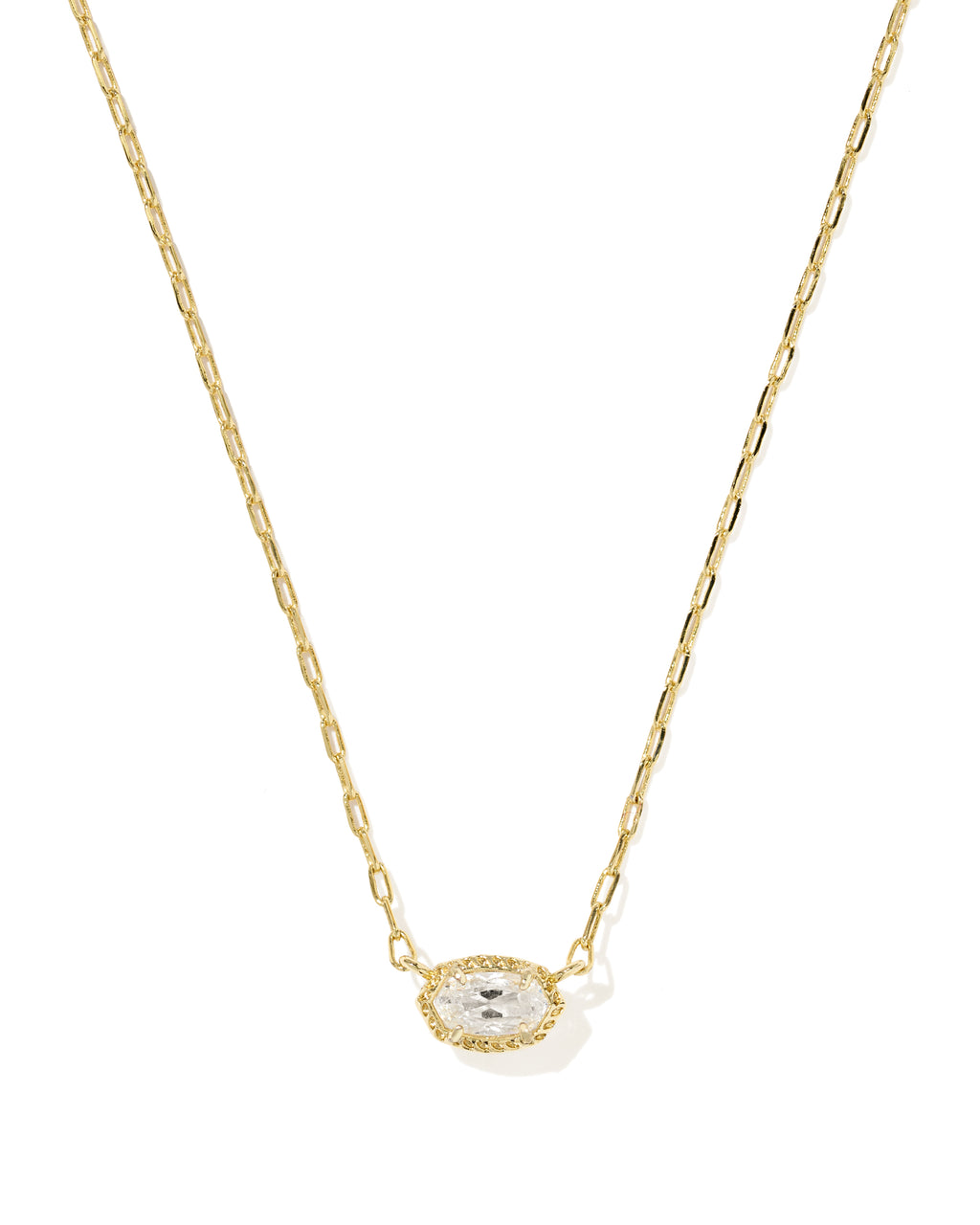A delicate gold chain necklace featuring an oval pendant with a clear central gemstone surrounded by a halo of small clear stones, set against a plain white background.