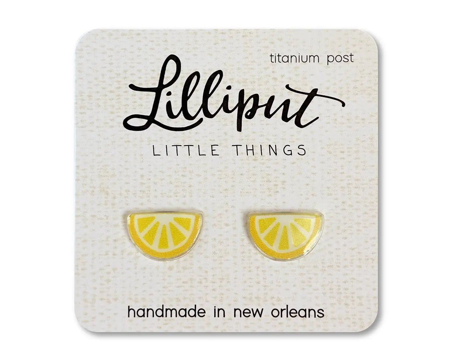 Lemon slice earrings on a Lilliput Little Things card with 'handmade in New Orleans' text.