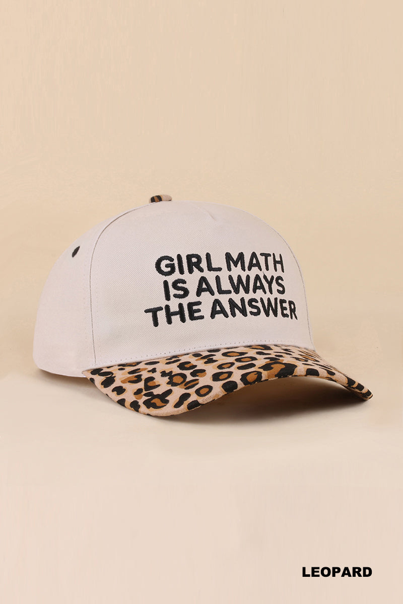 White hat with a leopard bill that reads “Girl math is always the answer” on a tan background