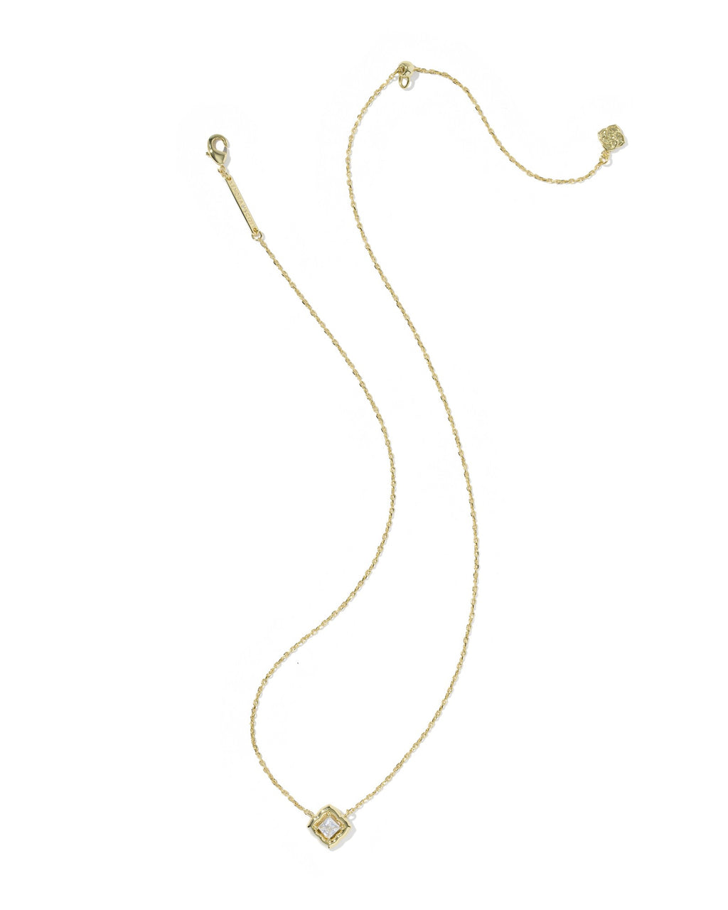 Gold necklace with a small pendant on a white background
