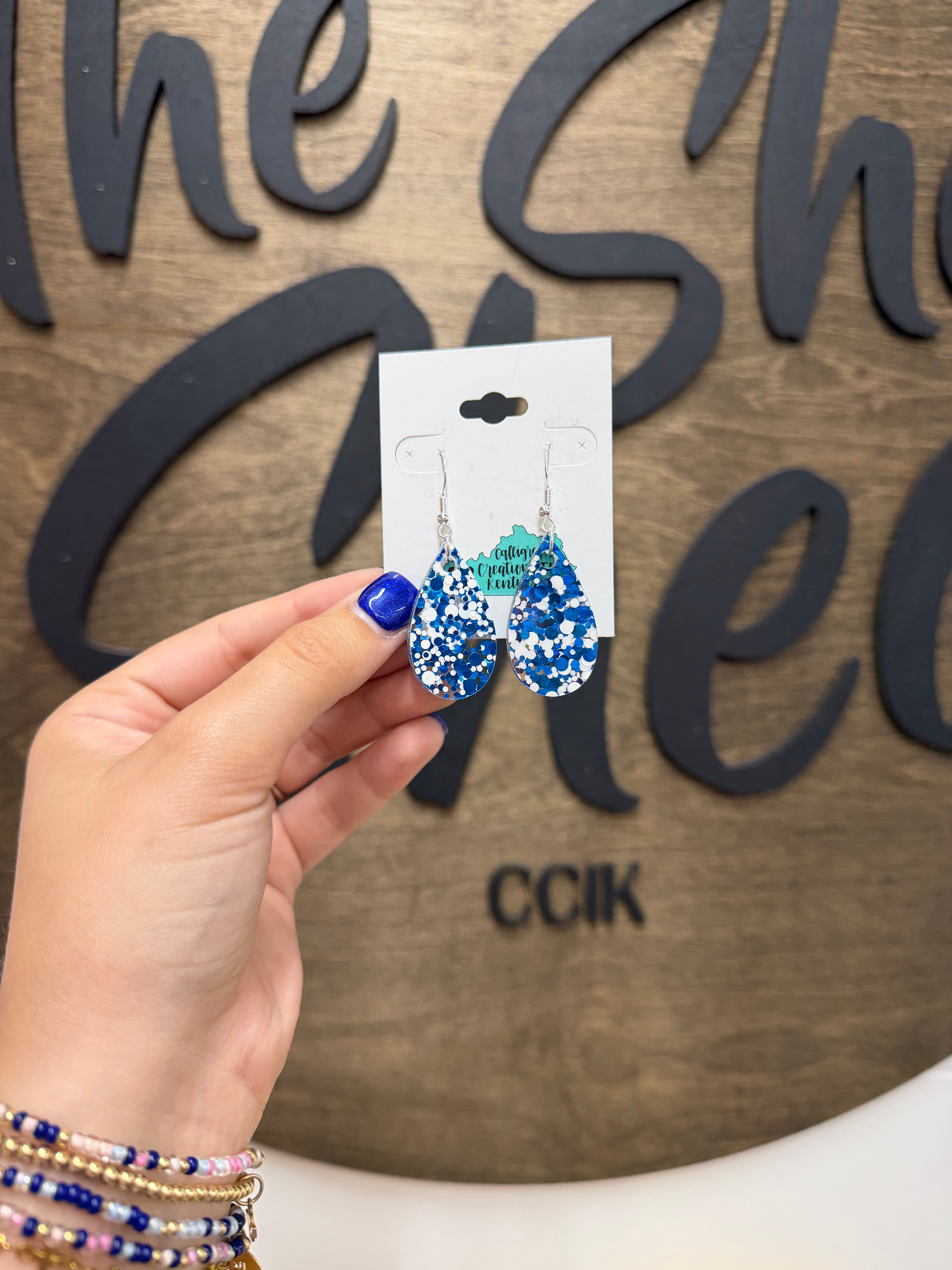 Blue and white glitter teardrop earrings