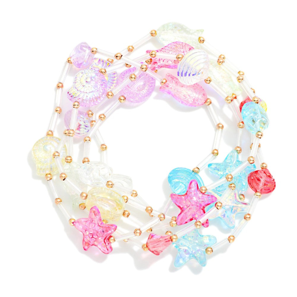 Multicolor bracelet set with seashells and starfish on a white background 