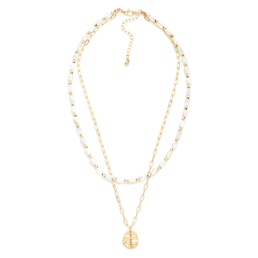 Layered Beaded & Chain Link Necklace Featuring Hammered Metal & Cross Pendant on a white background 