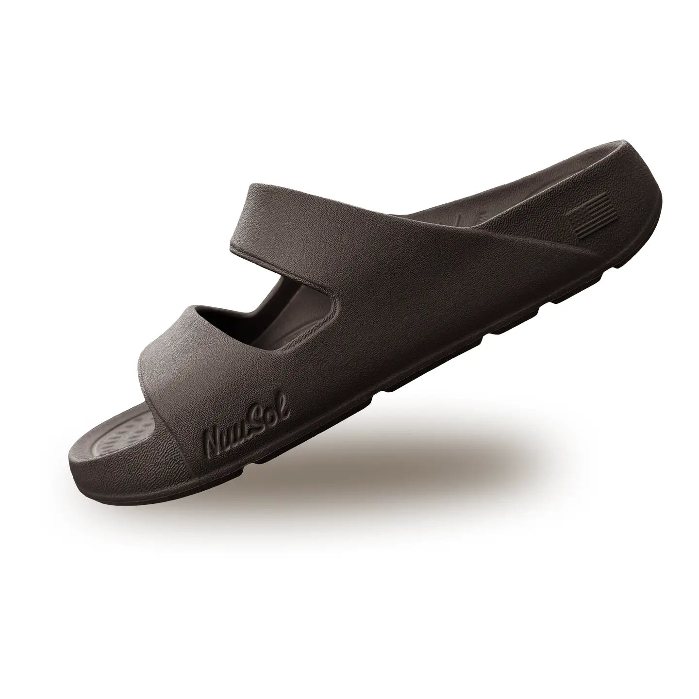 Dark brown two strap sandal on a white background.