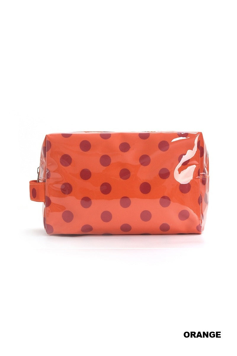 Pink and orange polka dot zipper pouch on a white background