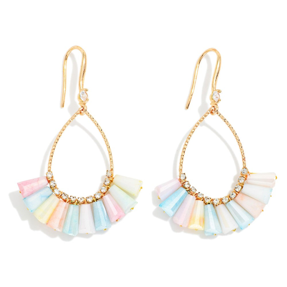 A pair of gold-tone drop earrings featuring a teardrop-shaped chain with a fan of pastel-colored shell-like discs in pink, blue, yellow, and white, accented by small clear rhinestones.