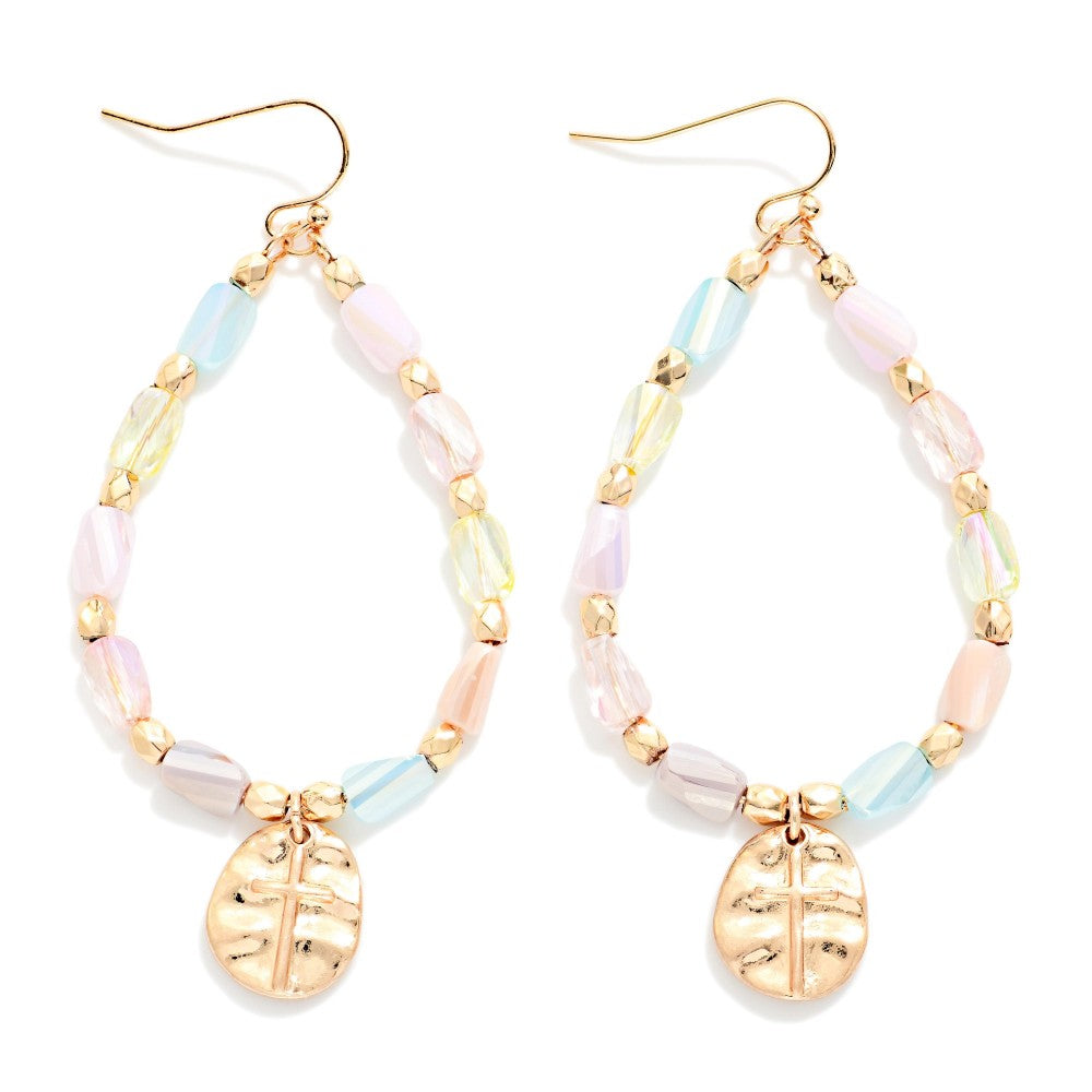 Faceted Cylinder Beaded Teardrop Earrings Featuring Hammered Metal Cross Pendant 
On a white background 