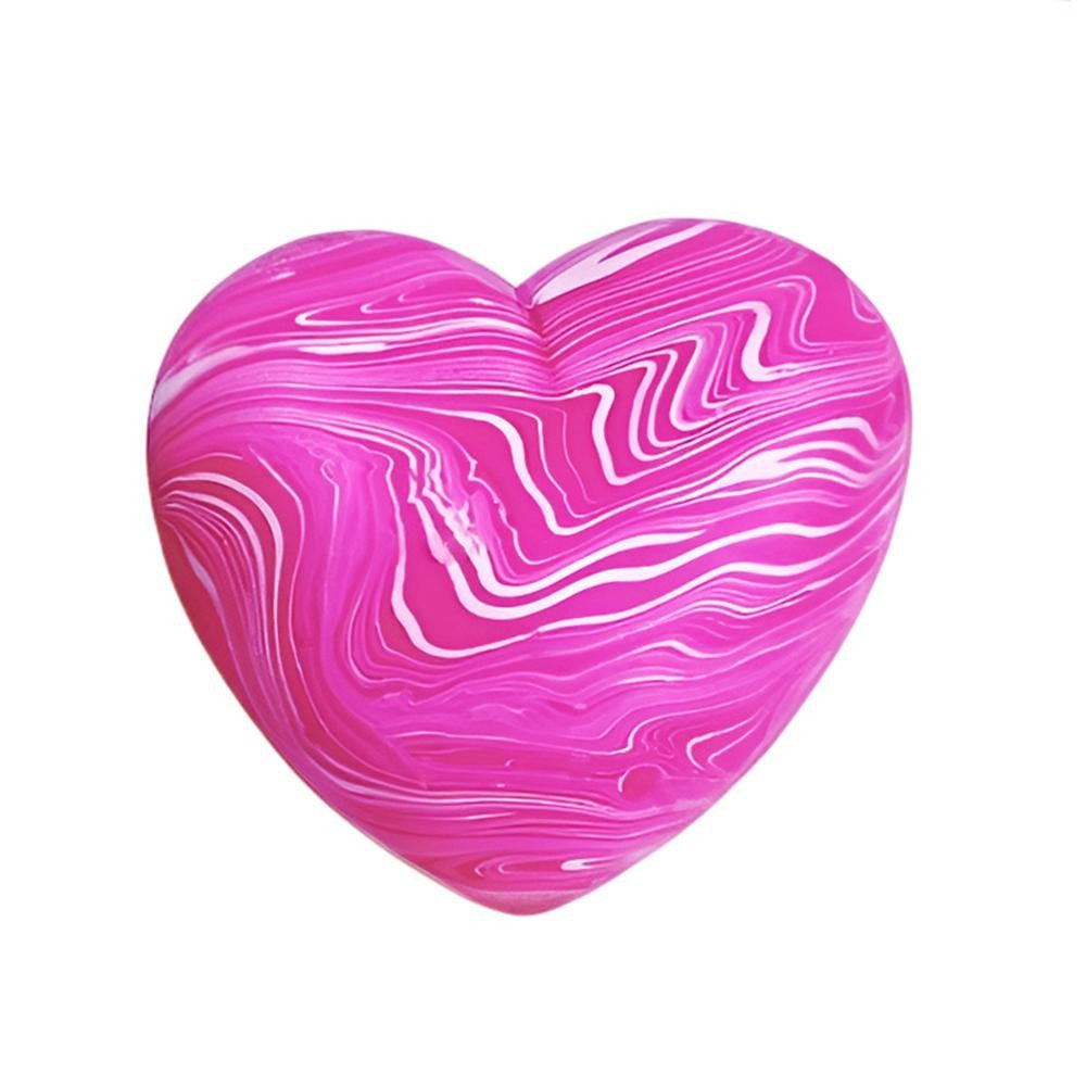 Heart-shaped squishy with pink and white marbled pattern on a white background