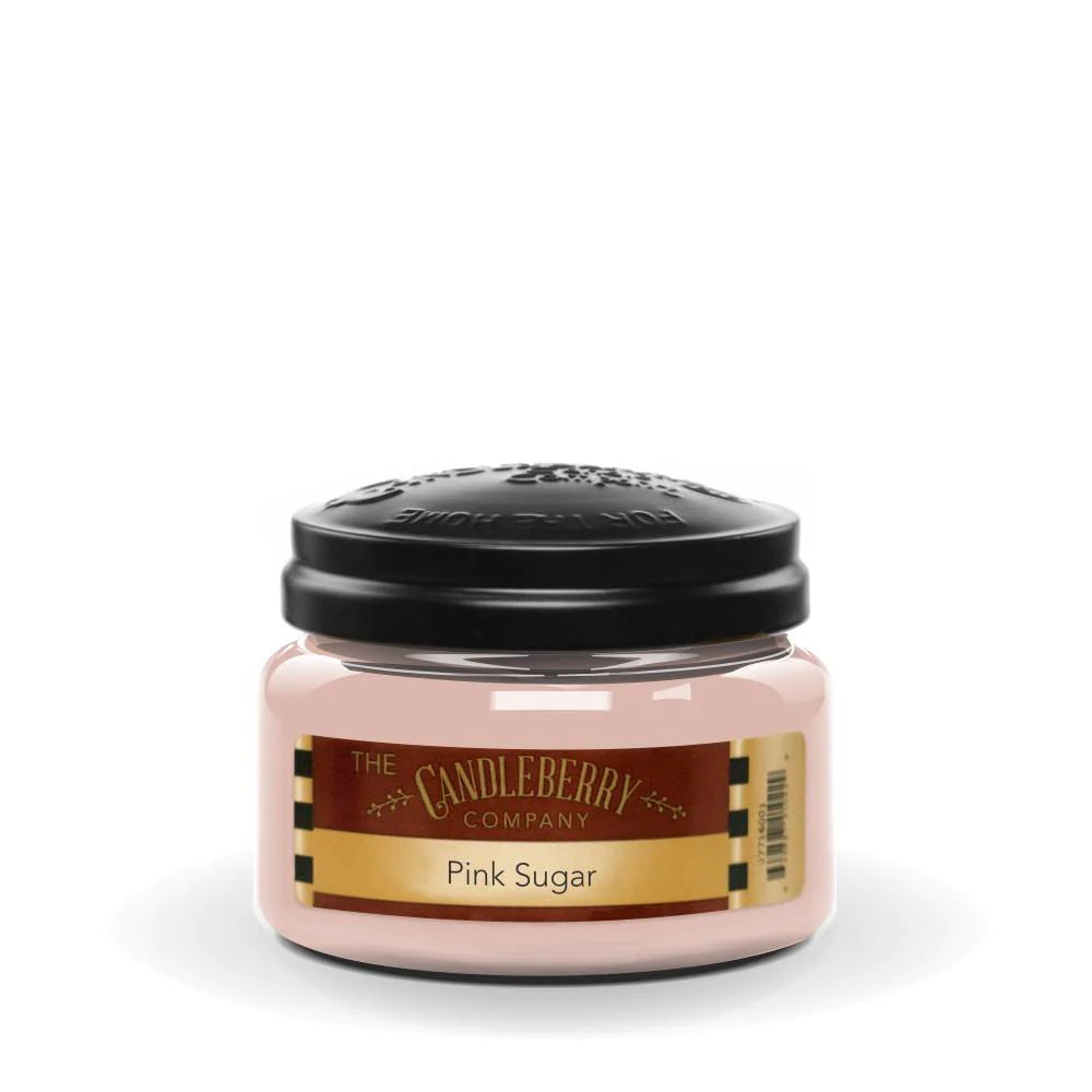 A small pink candle labeled 'The Candleberry Company Pink Sugar' with a black lid.