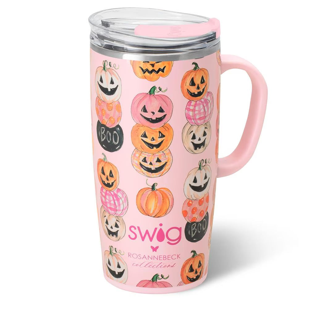 A pink travel tumbler with a Halloween pumpkin pattern, featuring a pink handle, clear lid, and the 'swig' logo with 'ROSANNEBECK collection' printed on the front.