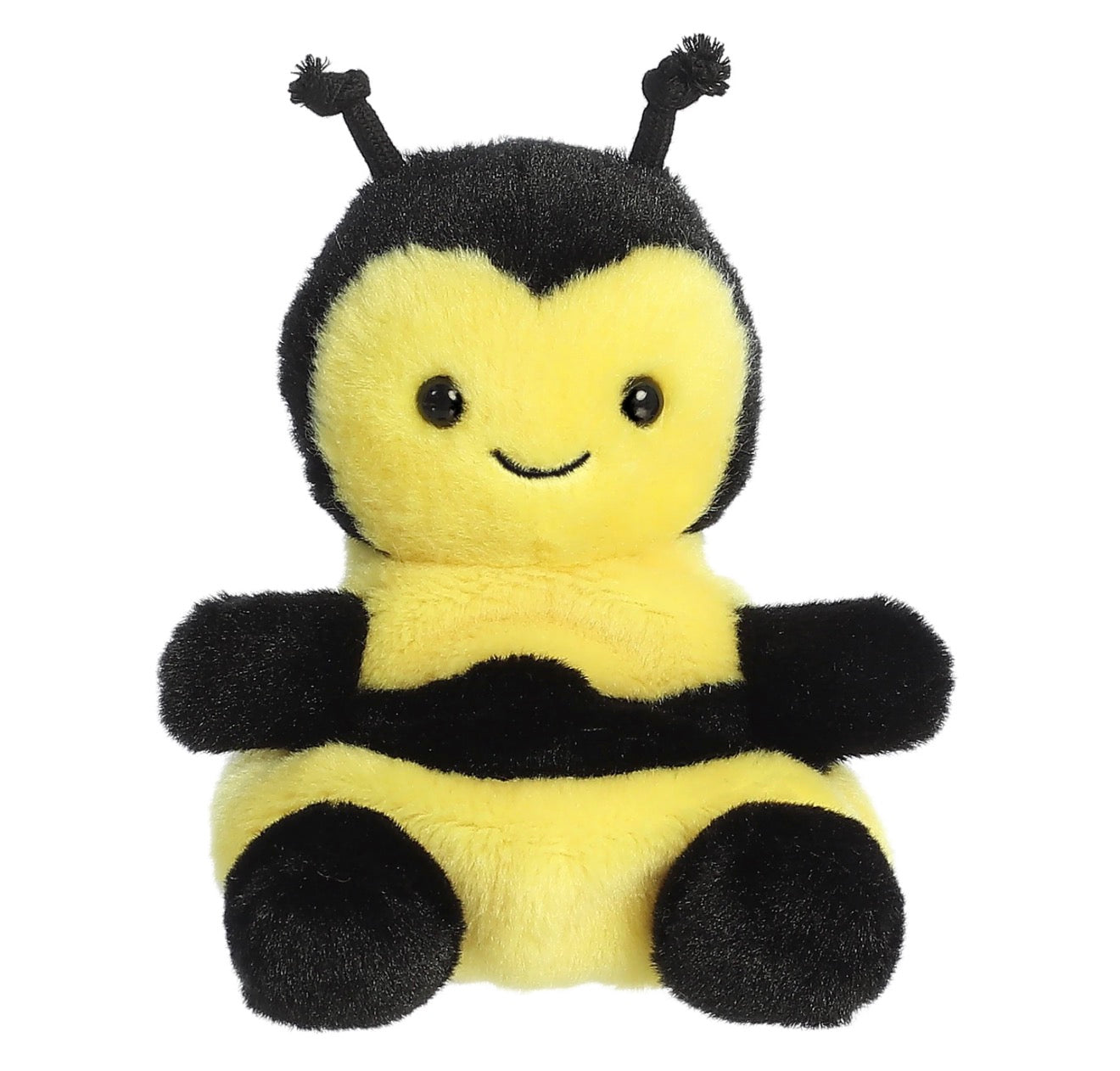 A cute, soft plush toy bumblebee with a yellow and black fuzzy body, smiling face, and black antennae, set against a solid white background.