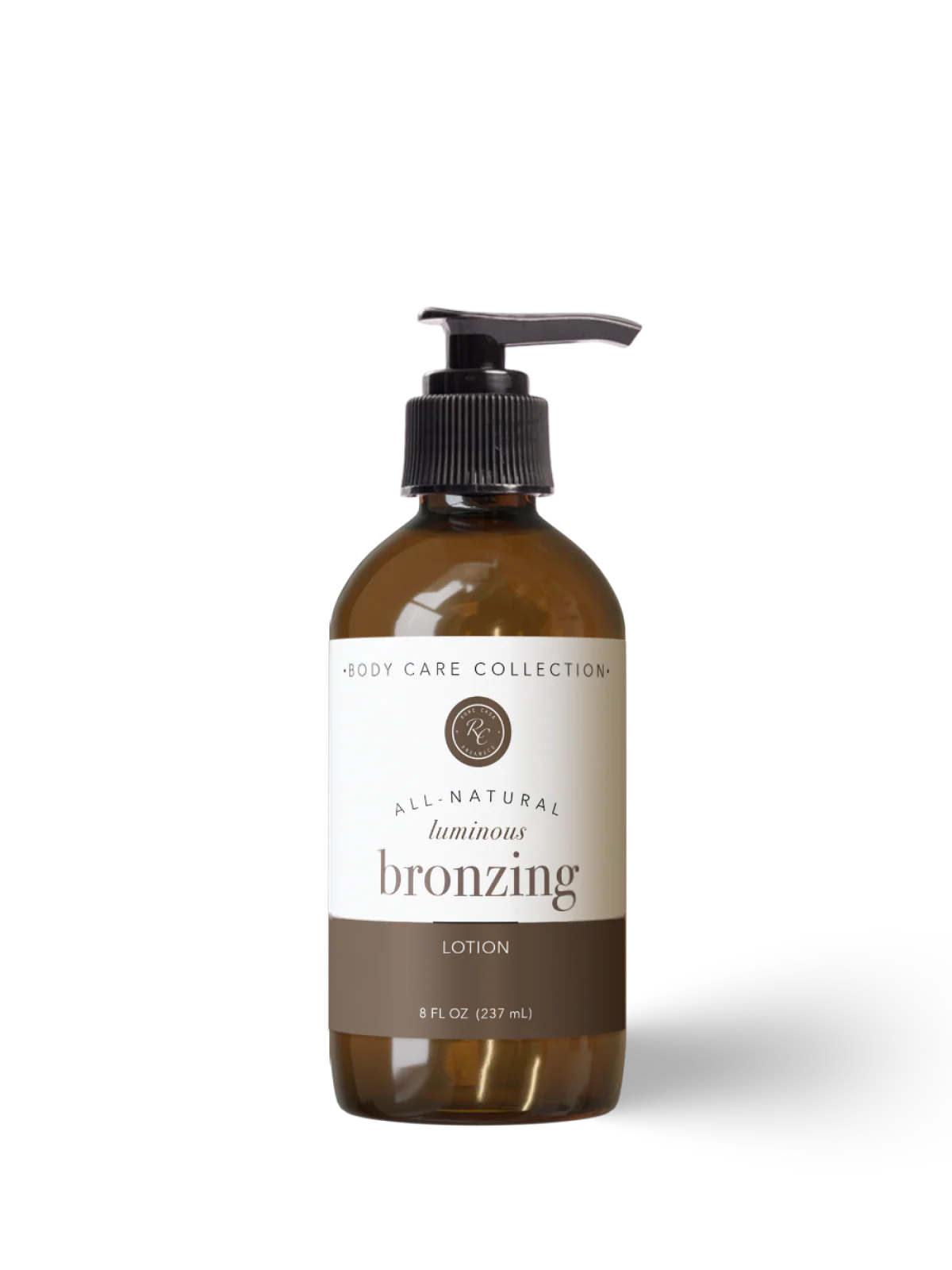 Brown bottle of all-natural luminous bronzing lotion on a white background