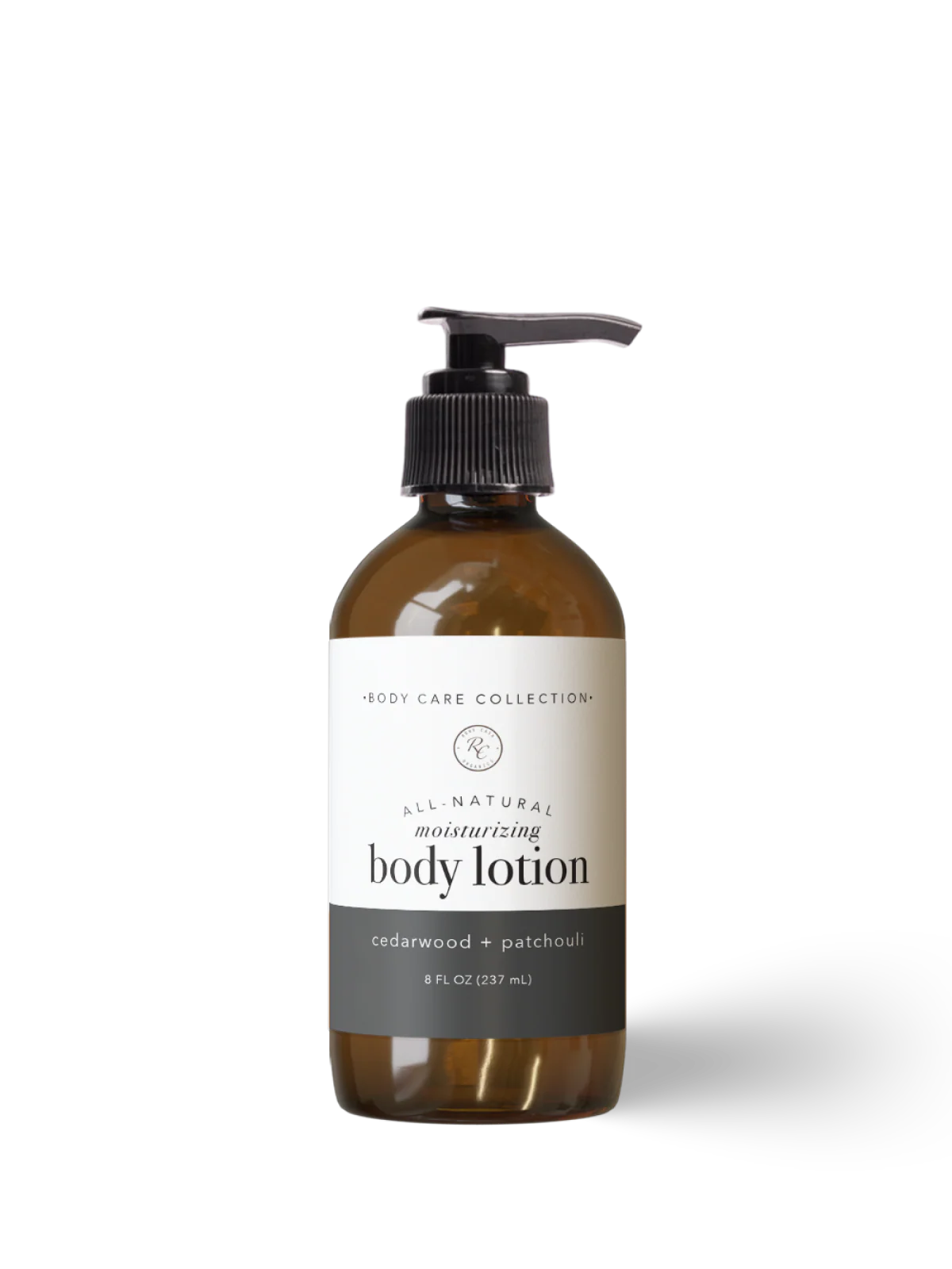 Brown bottle of all-natural moisturizing body lotion with a pump on a white background