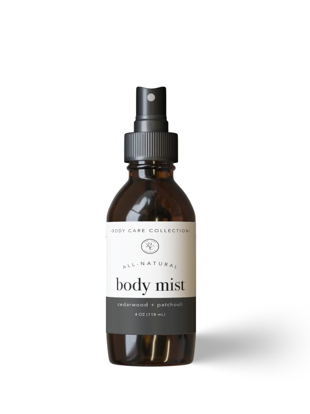 Natural cedarwood and patchouli scented body spray with rowe casa branding on a white background