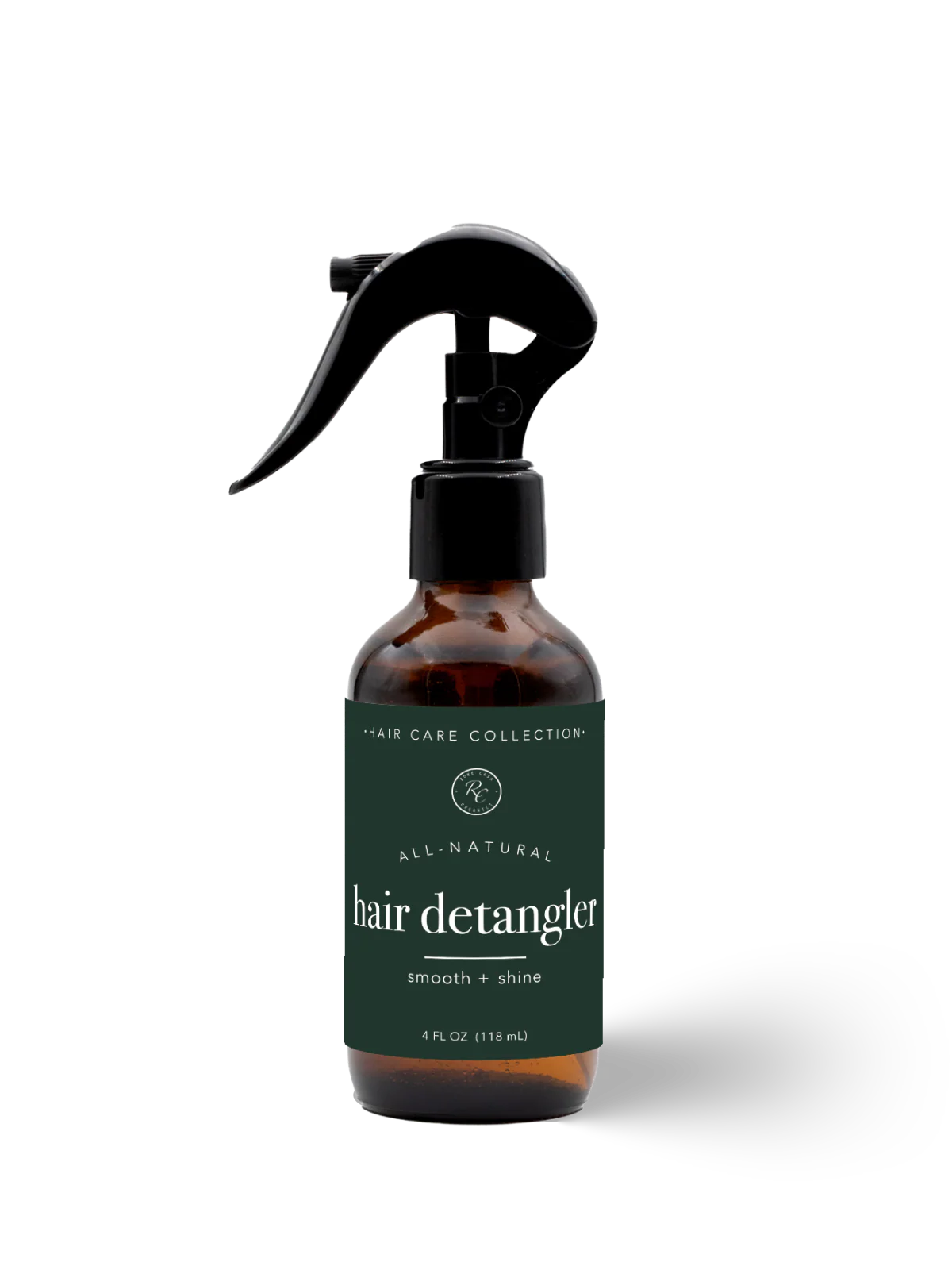 Hair detangler spray bottle with a green label on a white background