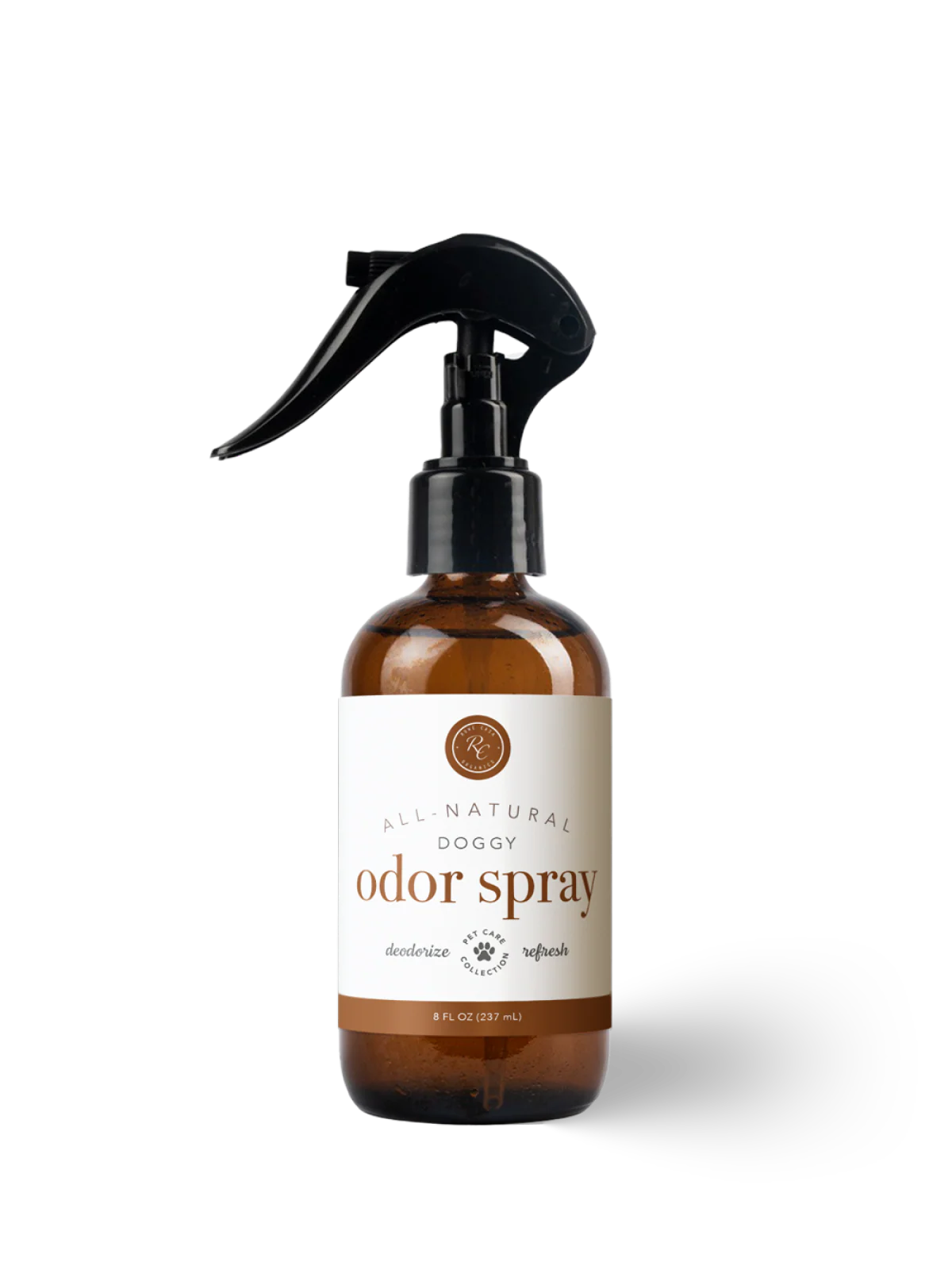 Brown doggy odor spray bottle with a label on a white background