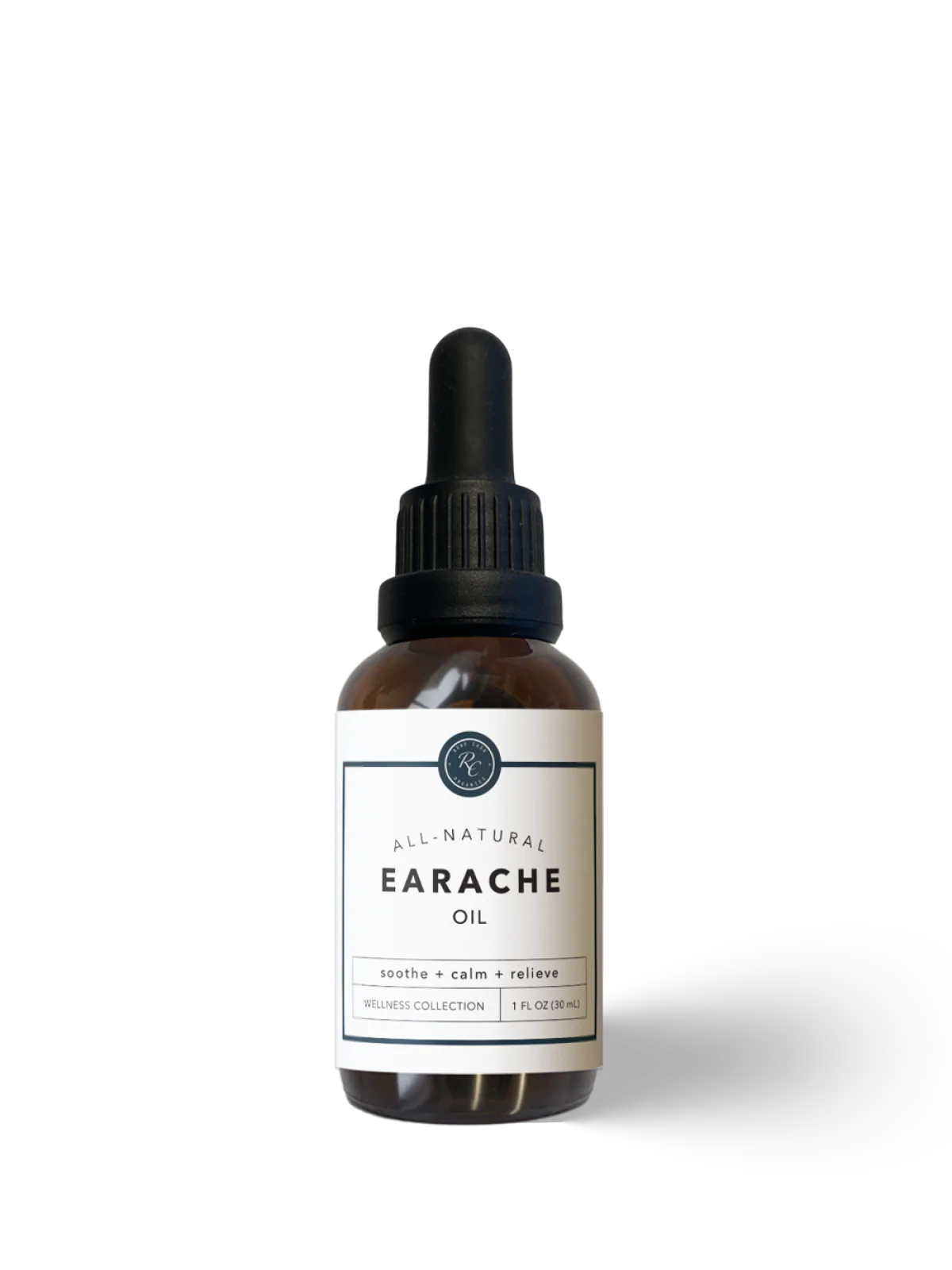Bottle of all-natural earache oil on a white background