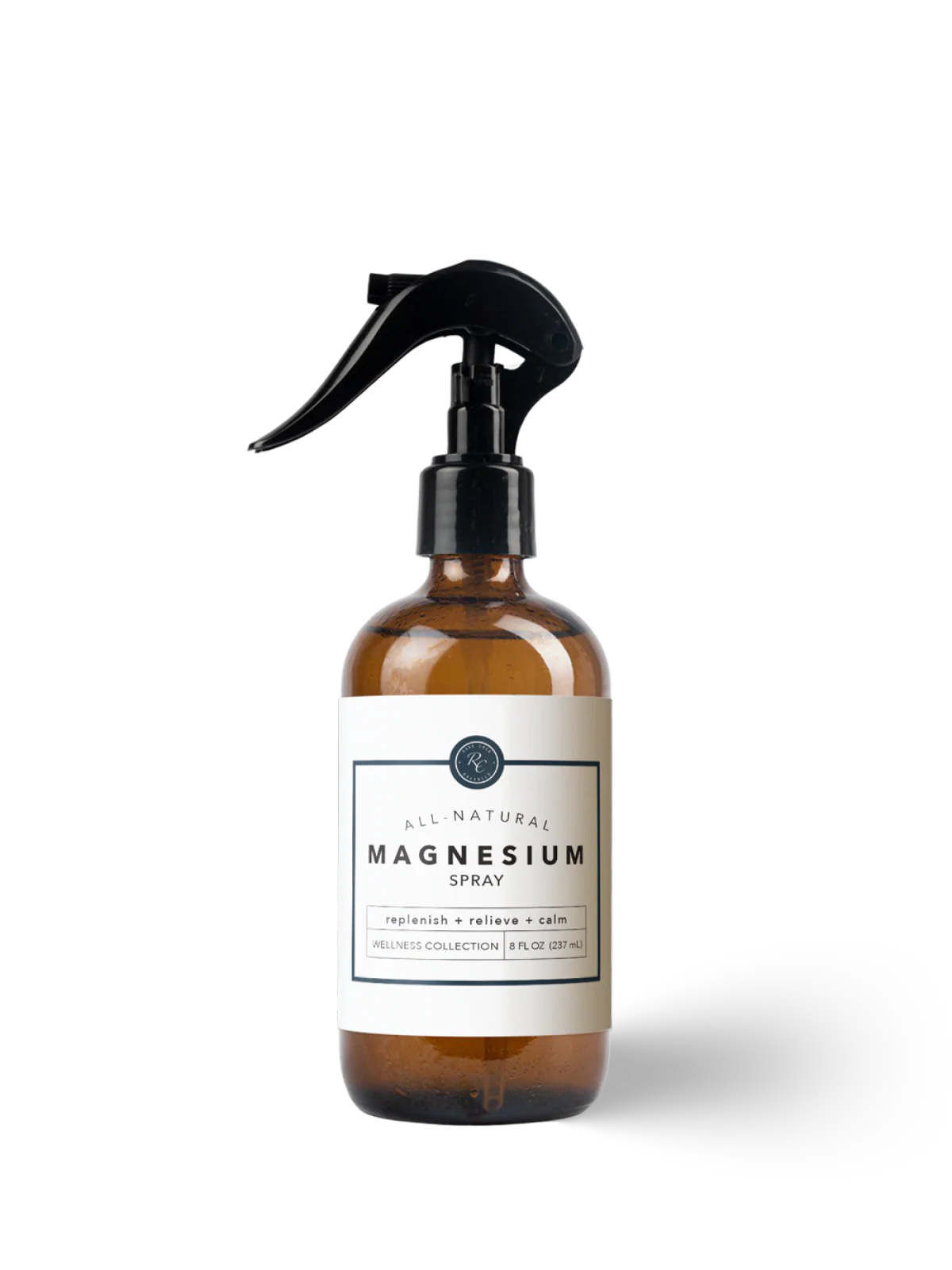 Brown spray bottle labeled 'All Natural Magnesium Spray' on a white background