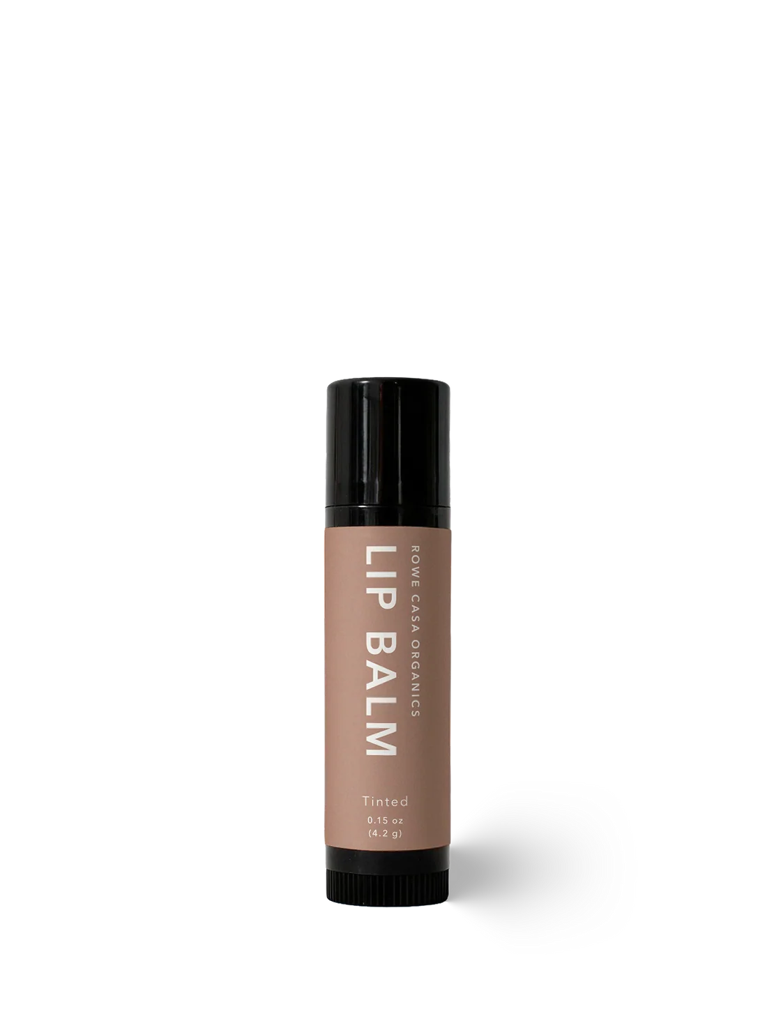 A single tube of Rowe Casa Organics Lip Balm in the shade Tinted, featuring a matte taupe-brown label and a black cap, centered on a clean white background.