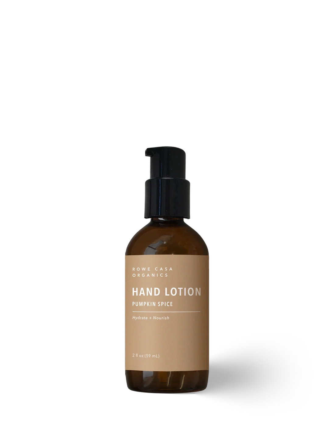 Rowe Casa Organics Pumpkin Spice Hand Lotion in a glass amber bottle on a white background.