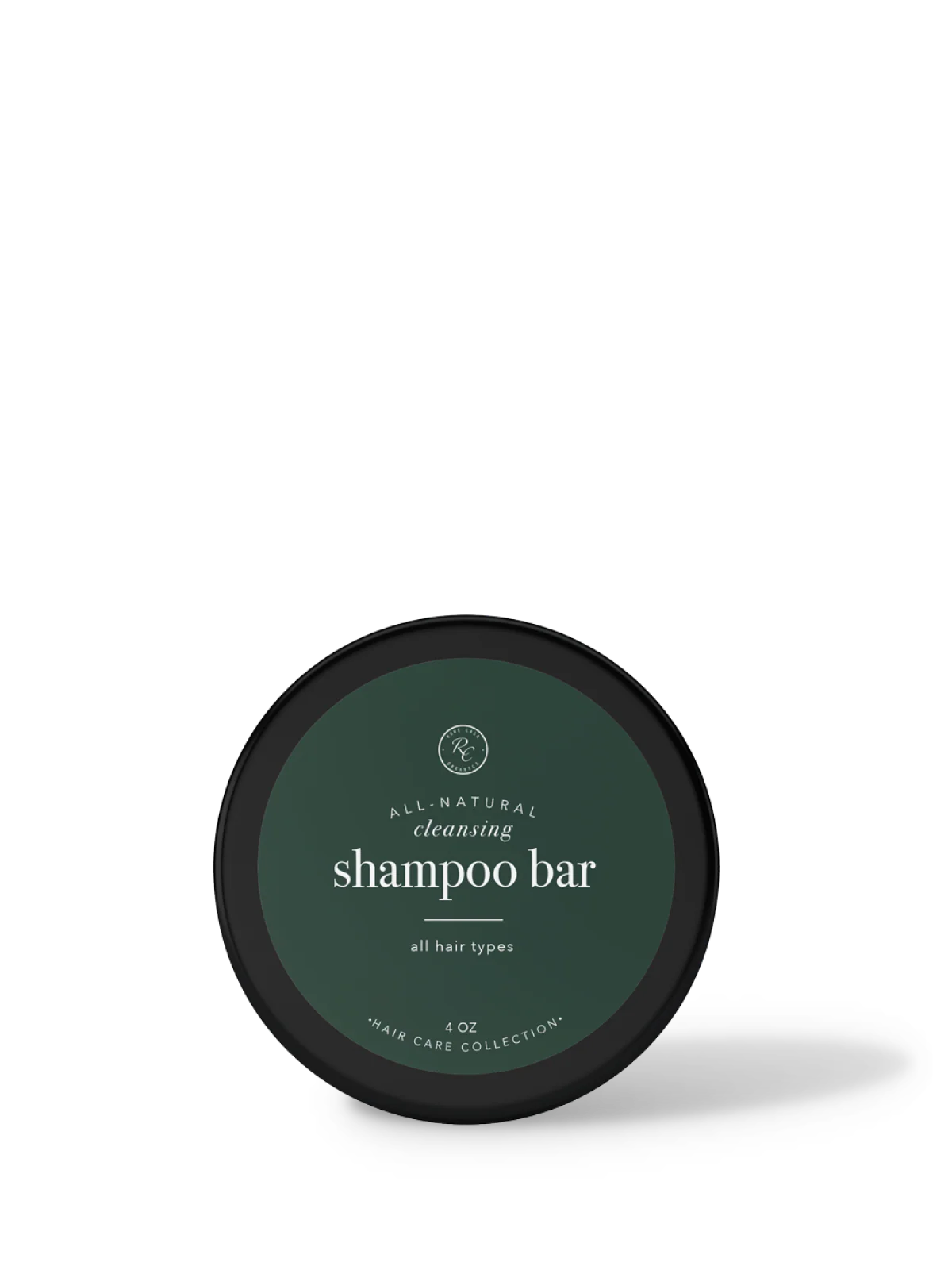 Shampoo bar container with green label on a white background