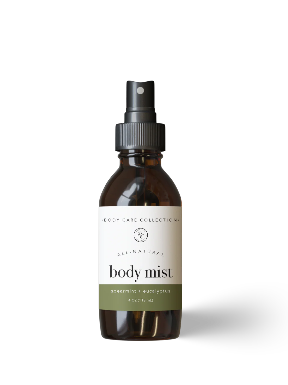 Brown glass bottle of all-natural body mist on a white background