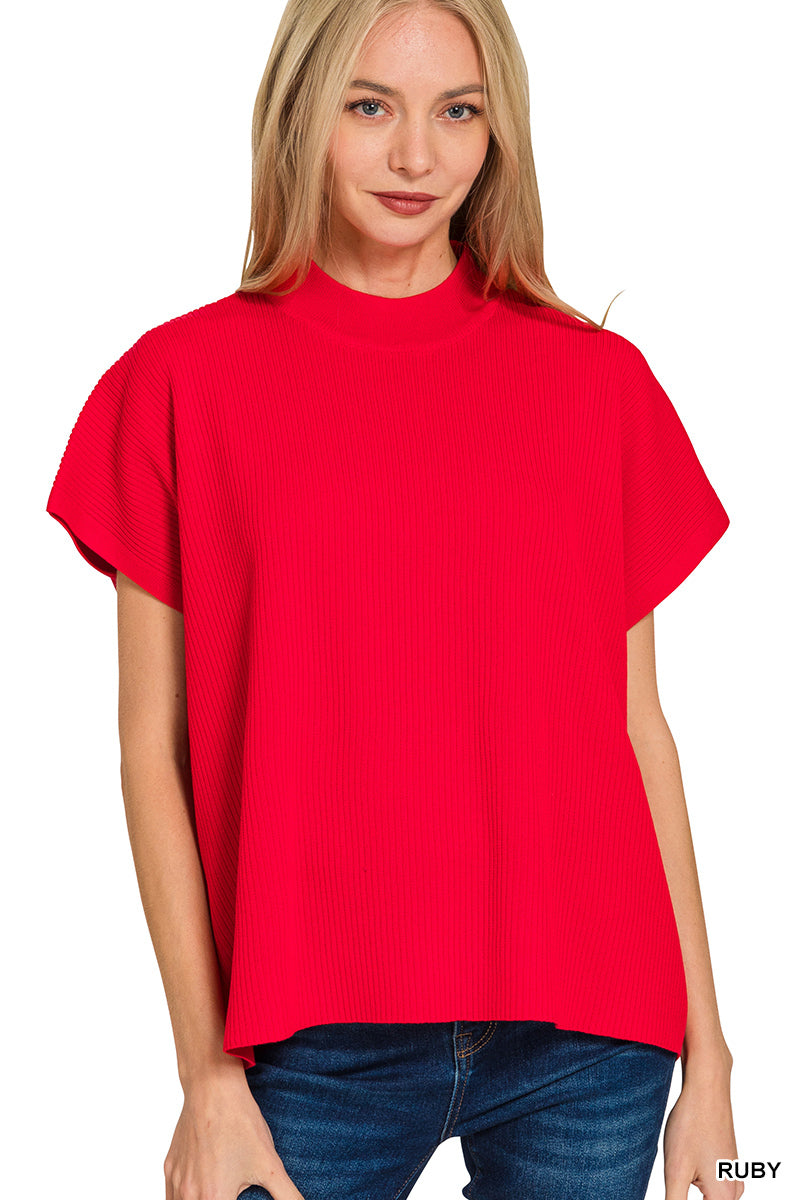 Woman wearing a red sweater on a white background