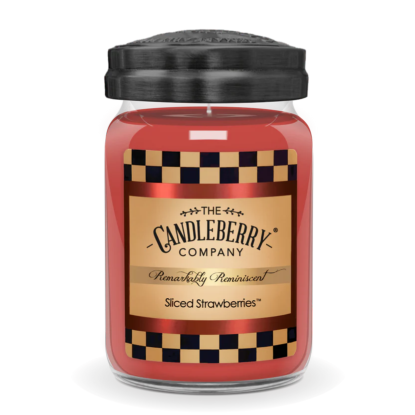 A jar candle with a label reading 'Sliced Strawberries' from The Candleberry Company.