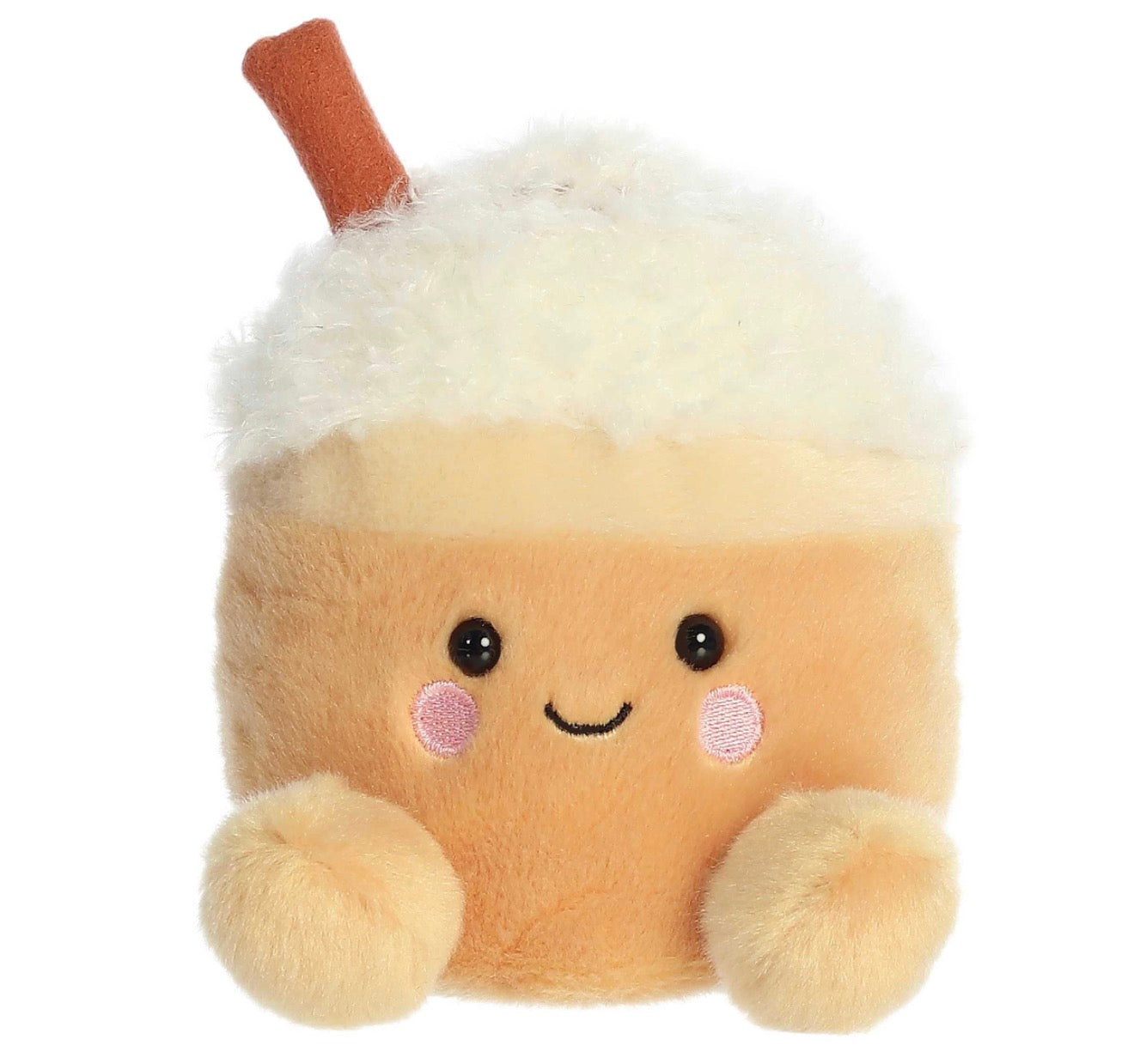 A cute plush toy shaped like a frothy drink cup, with a fluffy white top, cream-colored body, embroidered smiling face, pink cheeks, and a small brown stem on a white background.