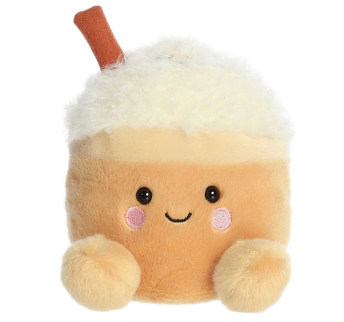 A cute plush toy shaped like a frothy drink cup, with a fluffy white top, cream-colored body, embroidered smiling face, pink cheeks, and a small brown stem on a white background.