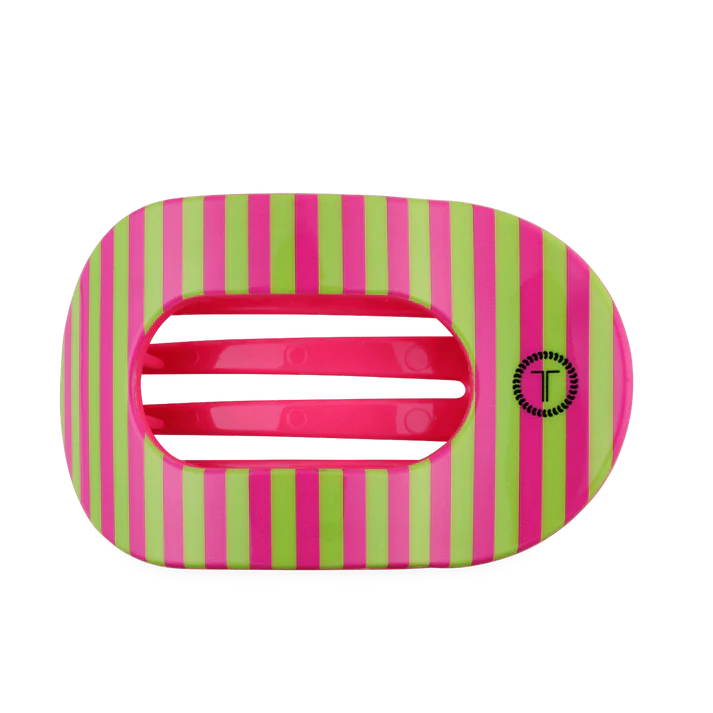 Pink and green round flat claw clip. 