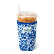 Blue and white patterned cup sleeve. 