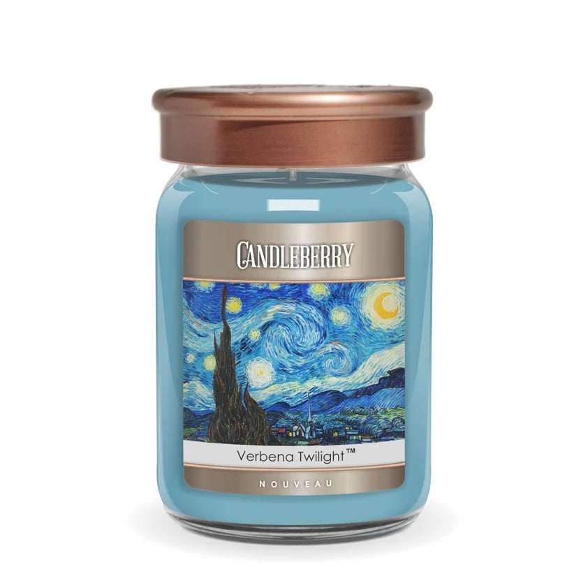 A blue-colored Candleberry candle with a printed label depicting a starry night sky and a castle.