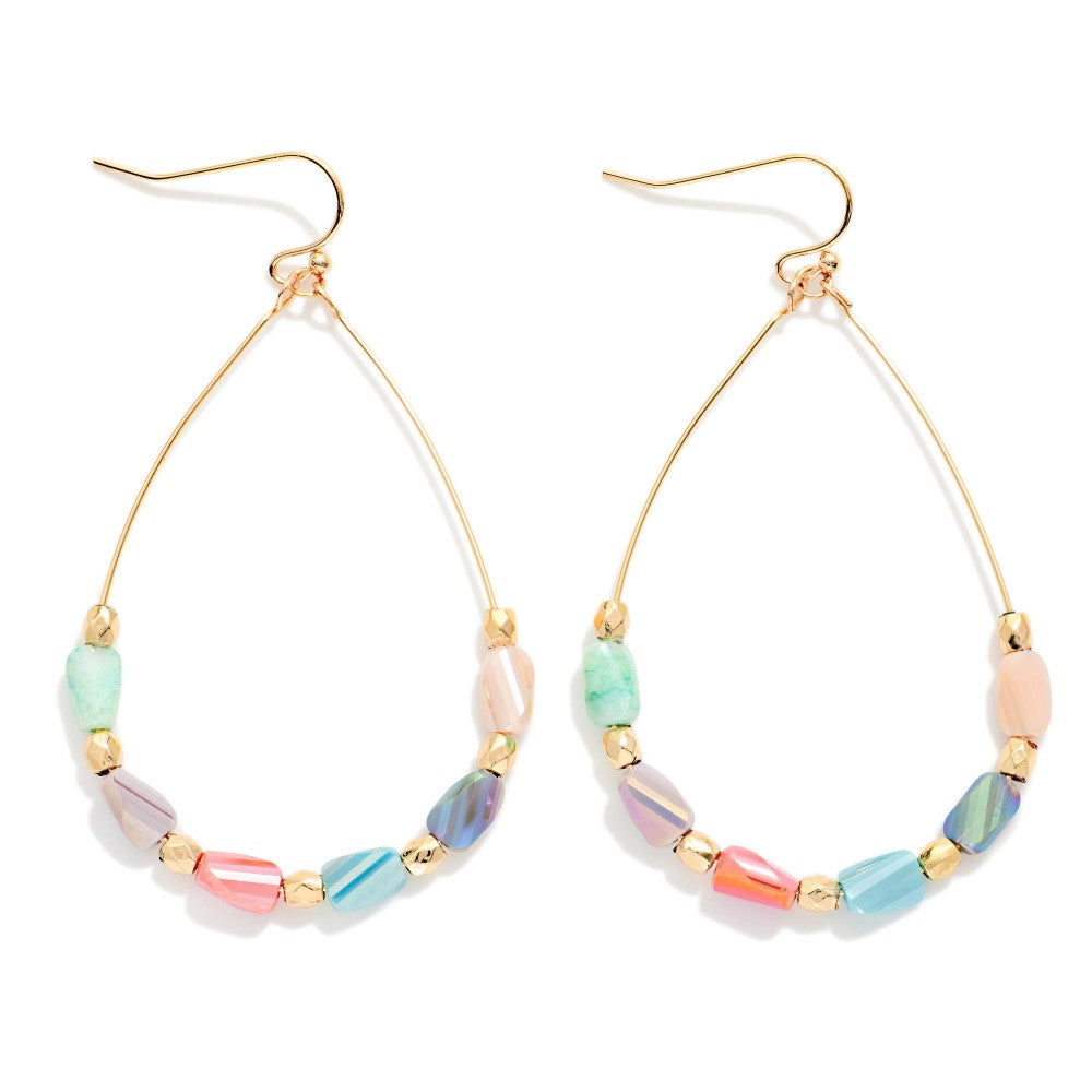 Wire Teardrop Earrings Featuring Faceted Cylinder Beads on a white background 
