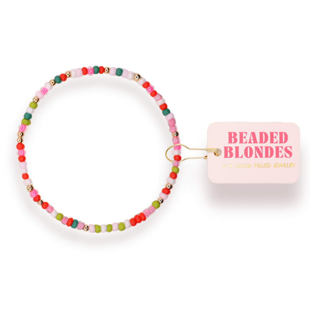 Beaded bracelet with colorful beads on a white background, featuring the brand 'Beaded Blondes'.