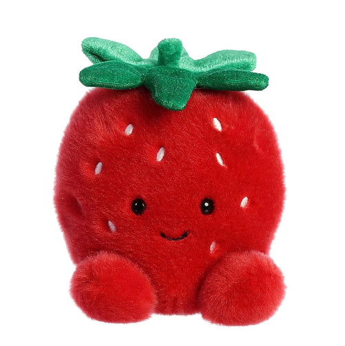 A red plush strawberry toy with a green leafy top, embroidered facial features, and small white seed details, centered on a plain white background.