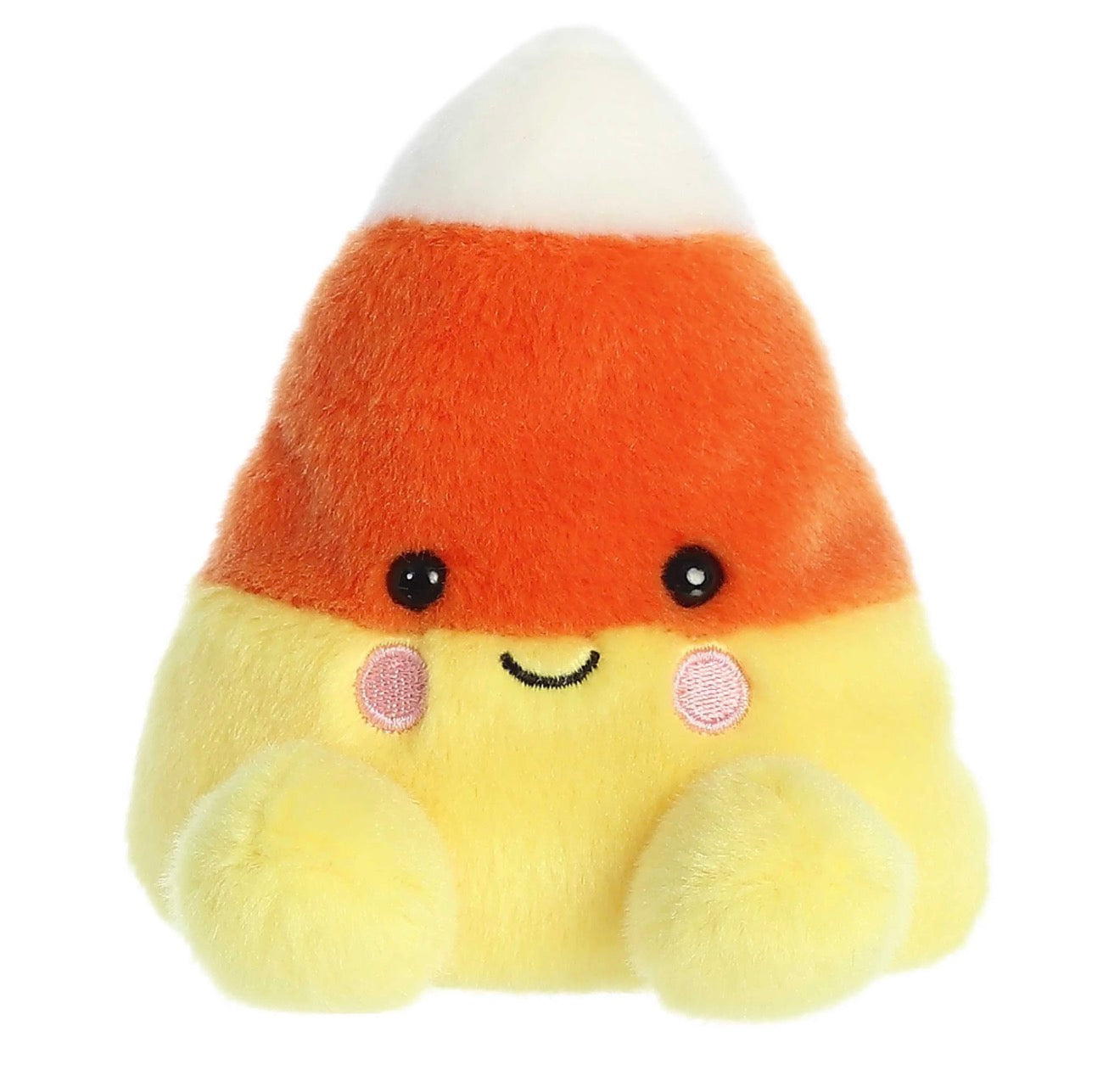 A cute, soft plush toy shaped like a candy corn with a smiling face, featuring orange, yellow, and white colors, set against a plain white background.