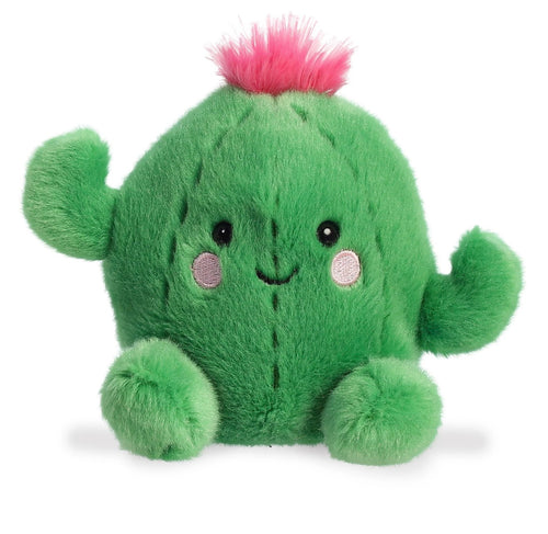 A green plush cactus toy with a bright pink fluffy top, embroidered facial features, and small pink cheeks, photographed on a clean white background.
