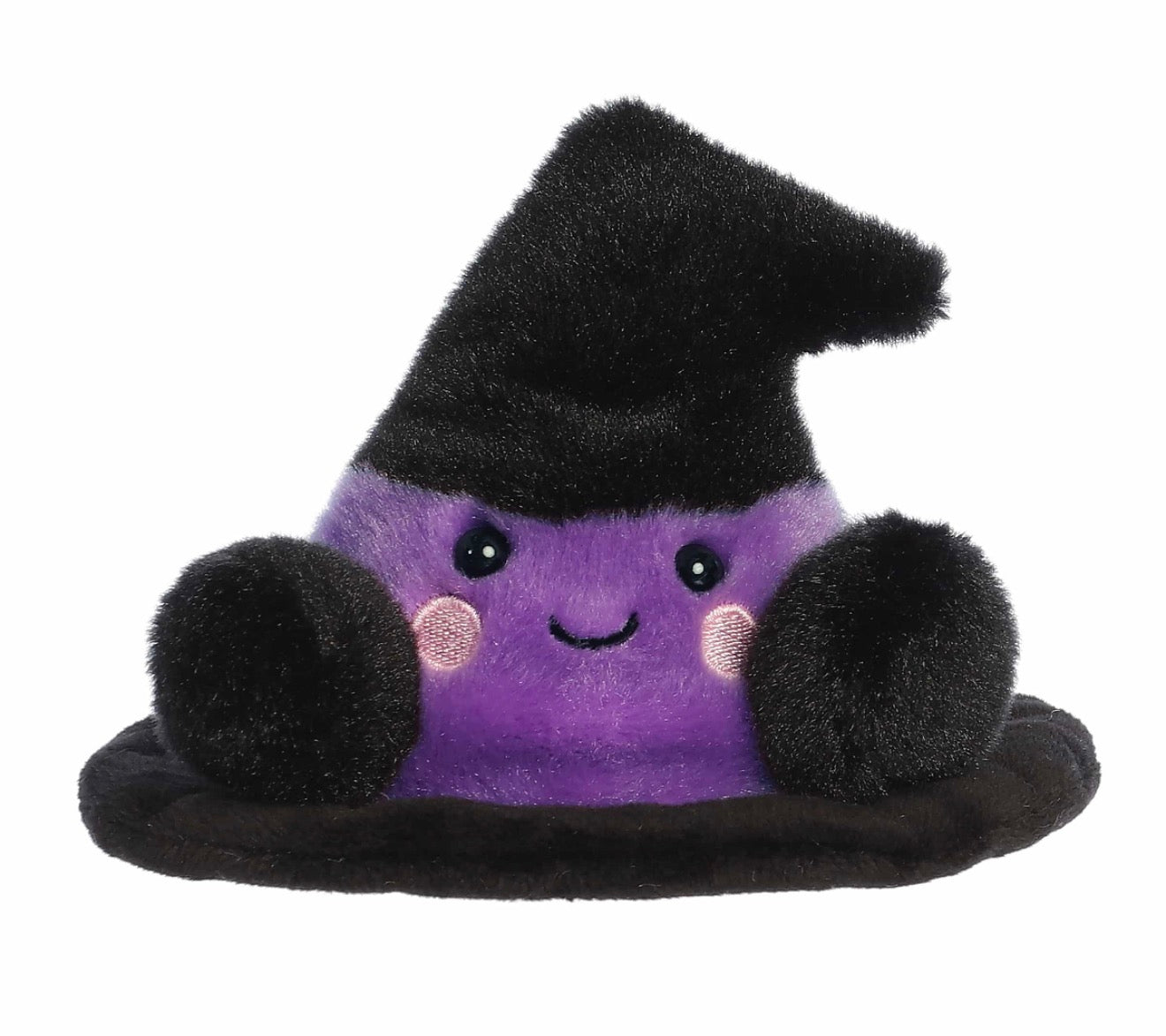 A cute plush toy shaped like a witch's hat, featuring a purple body with a smiling face and pink cheeks, topped with a black fuzzy pointed hat and sitting on a black brim, isolated on a white background.