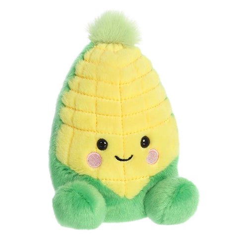 Plush toy shaped like a corn cob with a smiling face on a white background